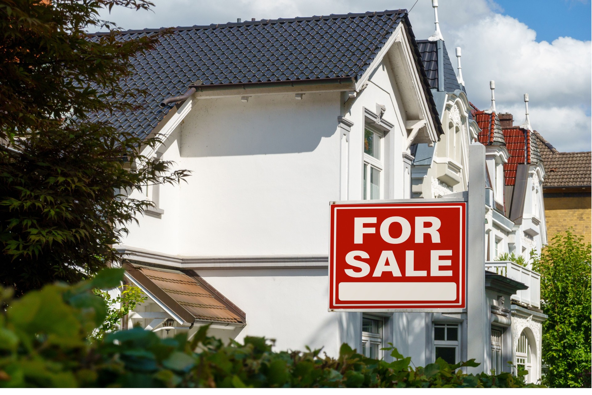 For Sale Sign on Residential Building